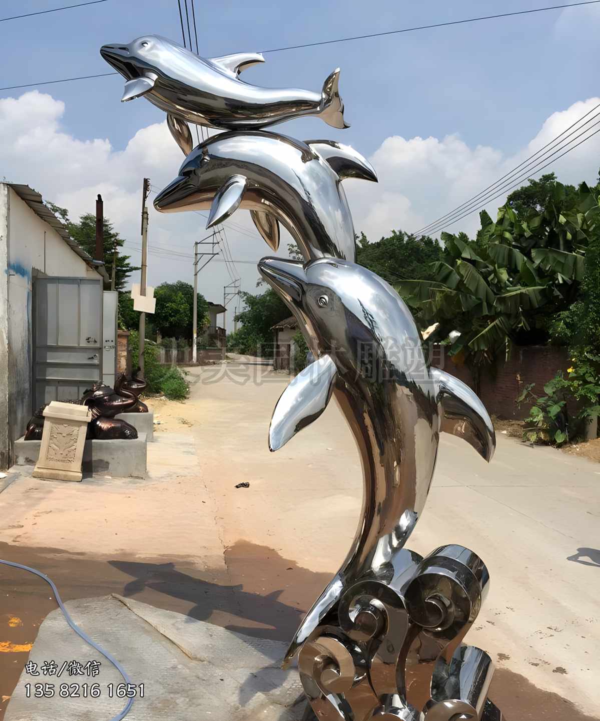 三只飛躍的不銹鋼海豚雕塑