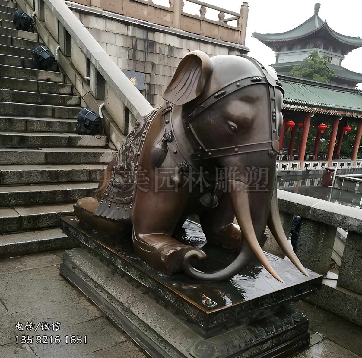 半跪在地的銅雕大象