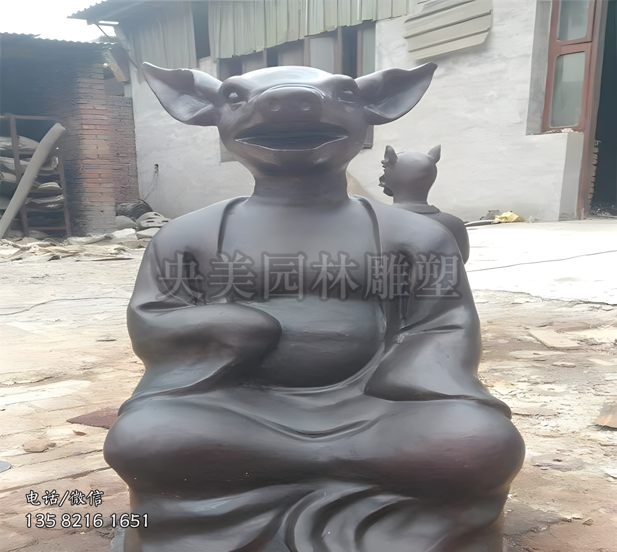 坐姿獸首人身亥豬銅雕塑